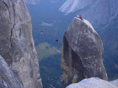 Beth Shilliday and another climber on the Lost Arrow Spire Tip Tyrolle...