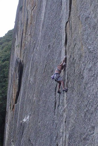 Surfer Bob on Hardd, one of the most classic 5.11 climbs in Yosemite V...