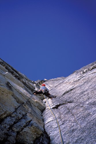 Joe Puryear leading another splitter granite pitch on the first ascent...