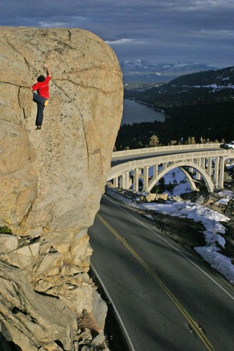 Chris McNamara climbing above the bridge near the Snowshed Wall on Don...