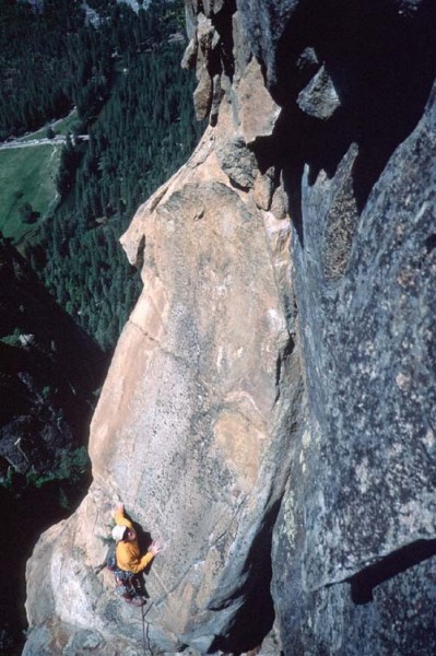 Climber leading pitch 4, just below the crux.
