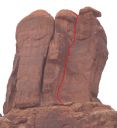 Three Penguins - Right Chimney 5.10c - Desert Towers, Utah, USA. Click for details.