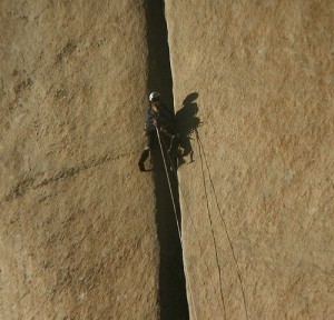 A climber in the middle of the notorius Groove Pitch during the last r...