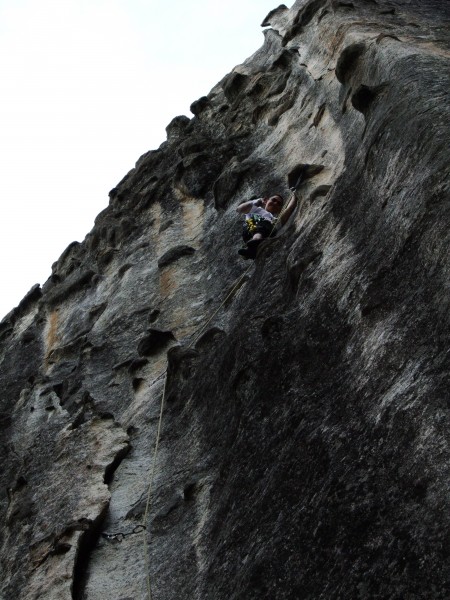 Mike on New Diversions, tying off knobs on the traverse.