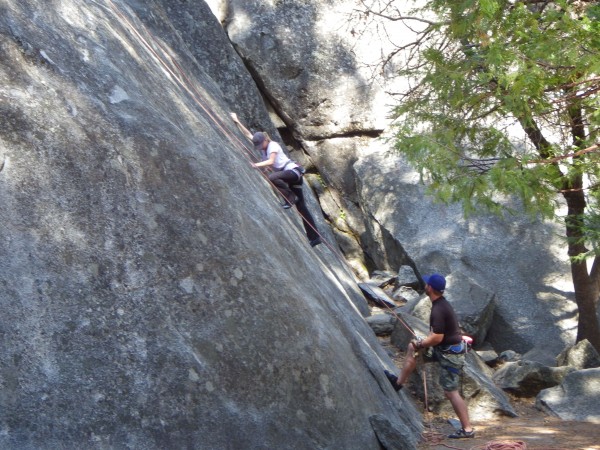 Natalie climbing on the swan slabs Yosemite