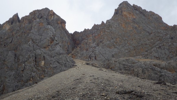 The initial scree to the base of the real climbing. The couloir winds ...