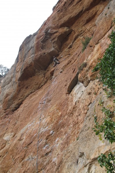 Nervously eyeing up the steep section of Crosta Panic, 7a+, Siurana.