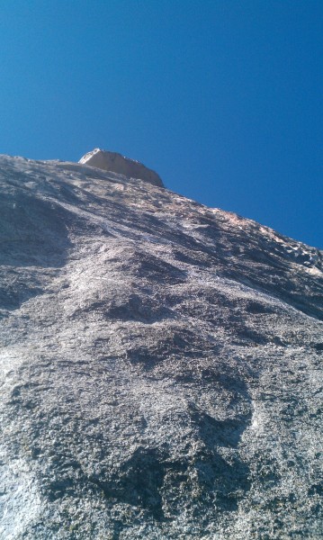 Wavy granite high on the face.