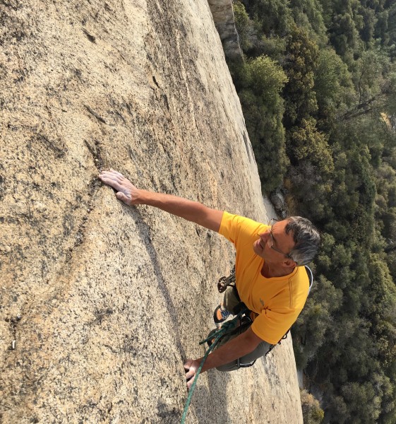 Mark gently caresses the rock.  Tenderly moving with the touch of a ma...