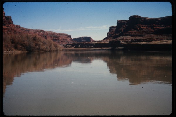 Farther down the river, deeper into the canyon.