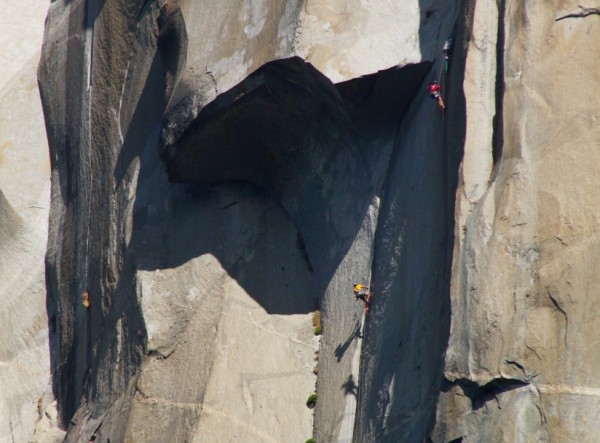 Me seconding the great roof pitch, Scott lowered off of the anchors to...